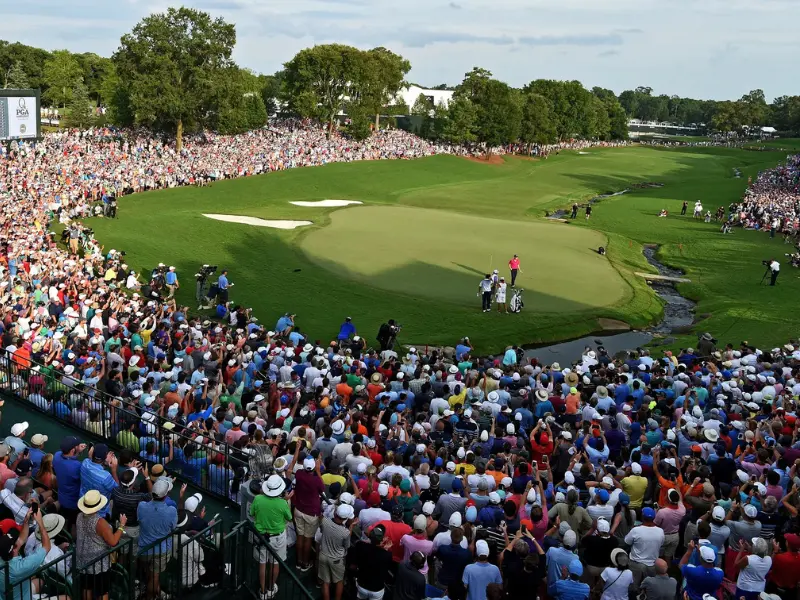 Professional golf tournament event with crowd and green 1